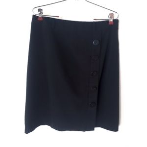 Mid-length back skirt with buttons up the side